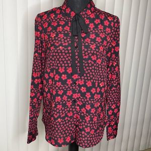 BCBGeneration button down shirt with tie around the collar. The collar is sewn.